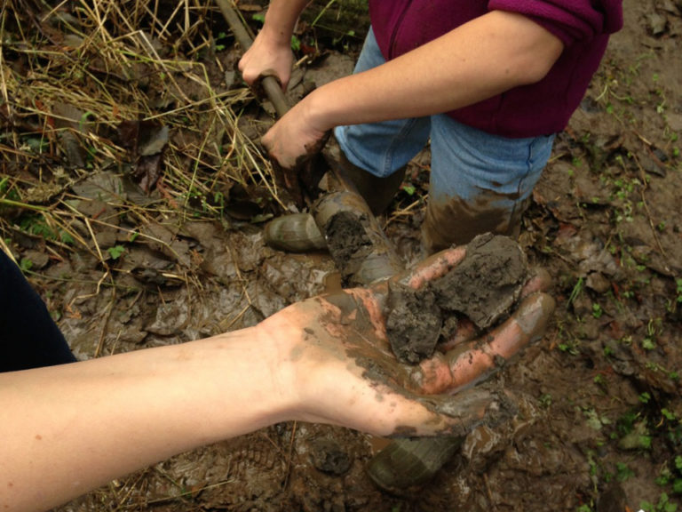 Engineers sampling mud